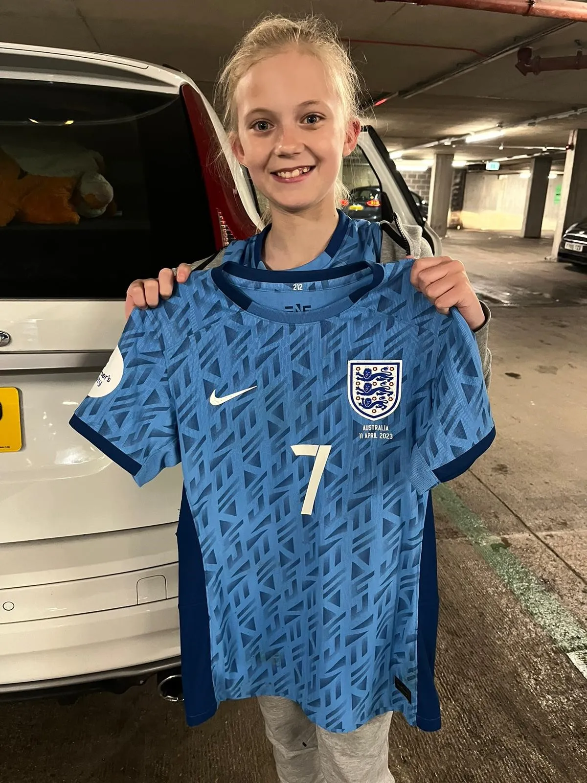 Maisie with her number 7 shirt